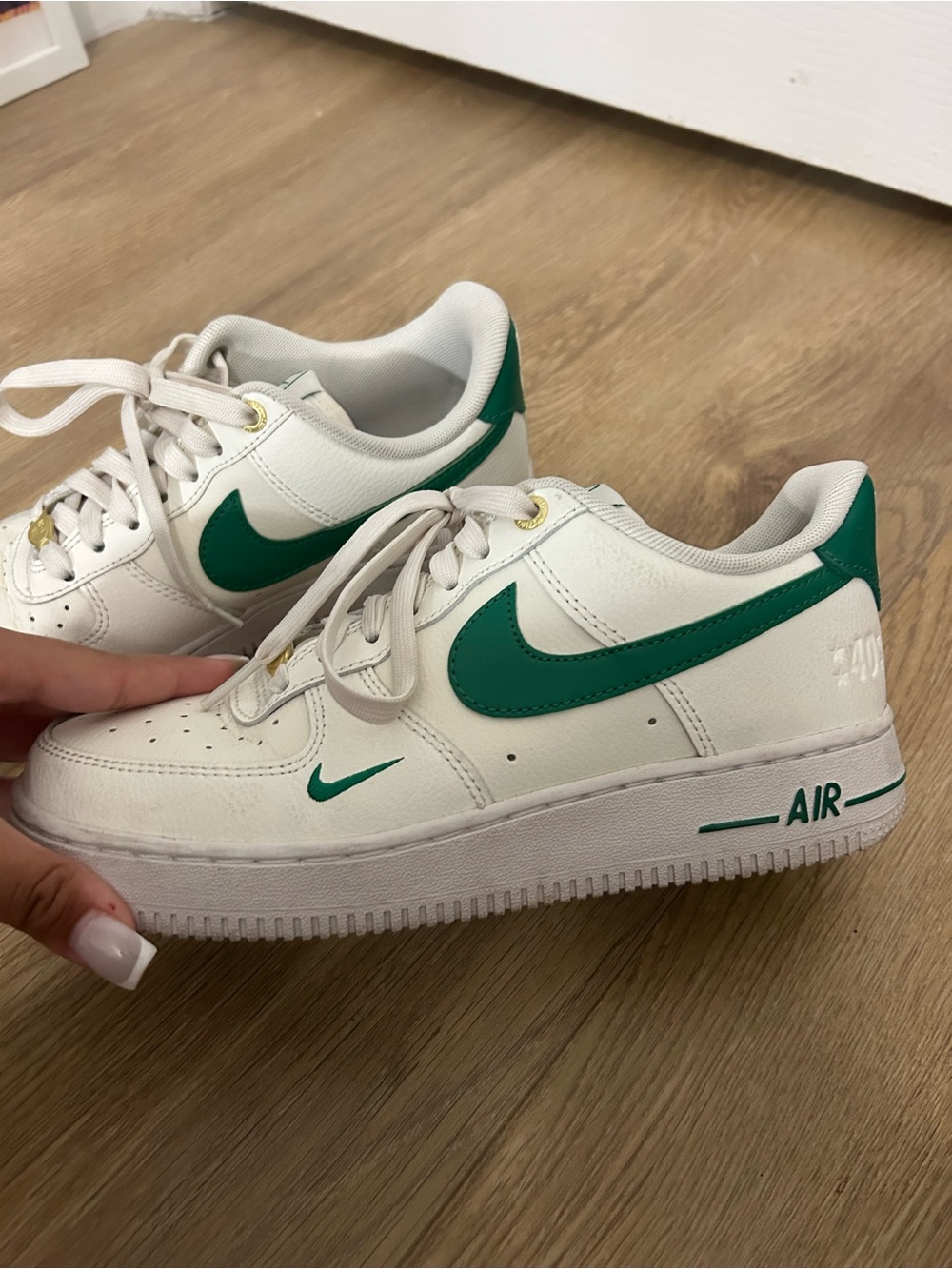 Nike White Leather Low-Top Sneakers with Green Swoosh - Picture 2 of 5